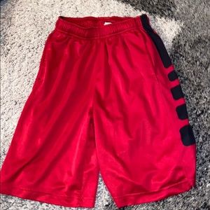 Red nike elite shorts with black stripe